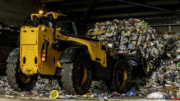 ‘It’s a human hand that has to clean up your mess’: where does your recycling go?